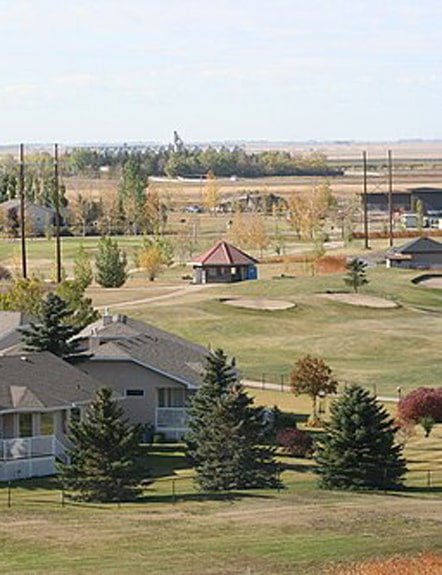 Professional lawn care services in Emerald Park near Regina, including mowing, weed control, fertilizer, and aeration
