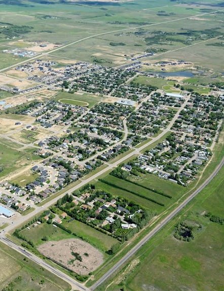 Professional lawn care services in Pilot Butte near Regina, including mowing, weed control, fertilizer, and aeration