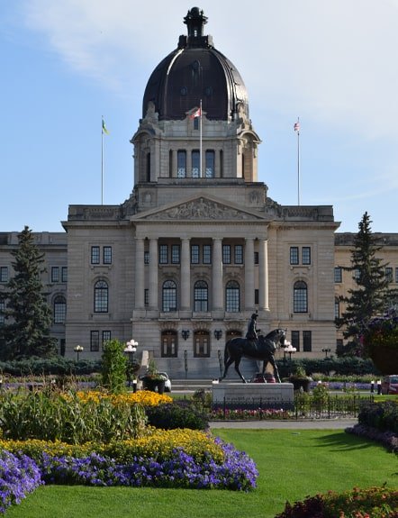 Professional lawn care services in Regina, including mowing, weed control, fertilizer, and aeration