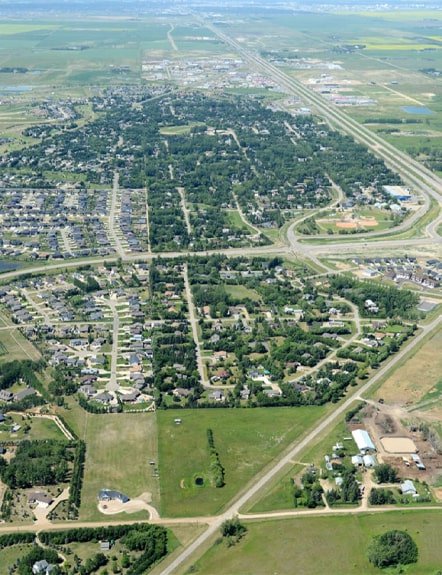 Professional lawn care services in White City near Regina, including mowing, weed control, fertilizer, and aeration