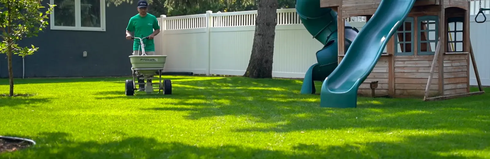 WeedPro Technician Fertilizing yard