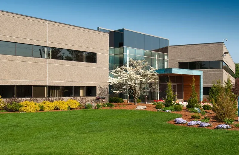 commercial building with green healthy grass