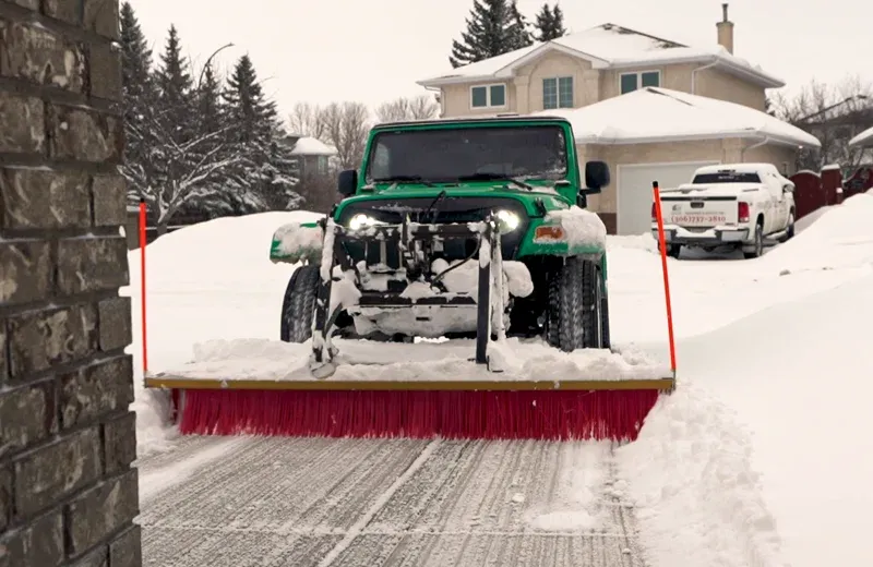 removing snow from driveway