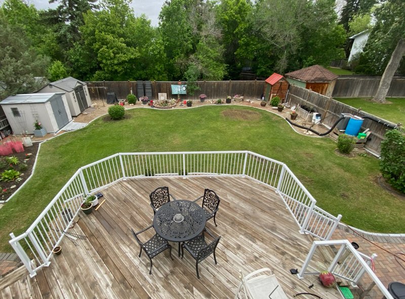 Dry and patchy backyard lawn in Regina before Weed Pro lawn care treatment
